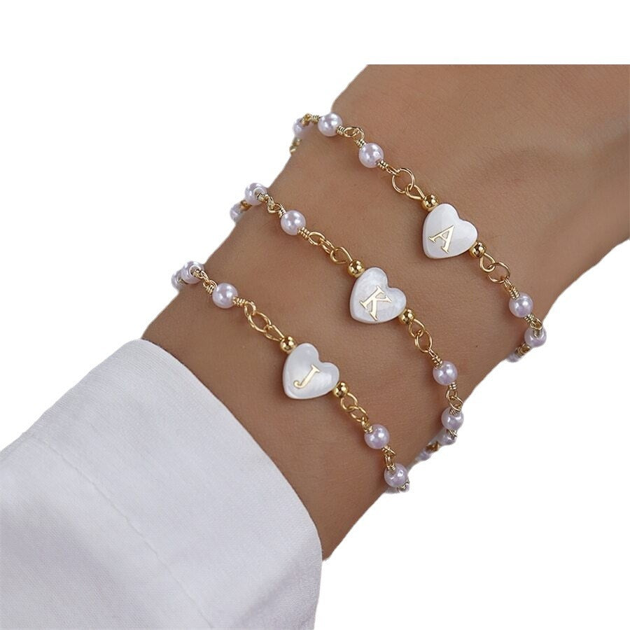 European And American Cross-border New Style Personalized 26 Letter Pendant Bracelet Imitation Pearl Chain Heart-shaped Bracelet Niche Elegant Jewelry For Women