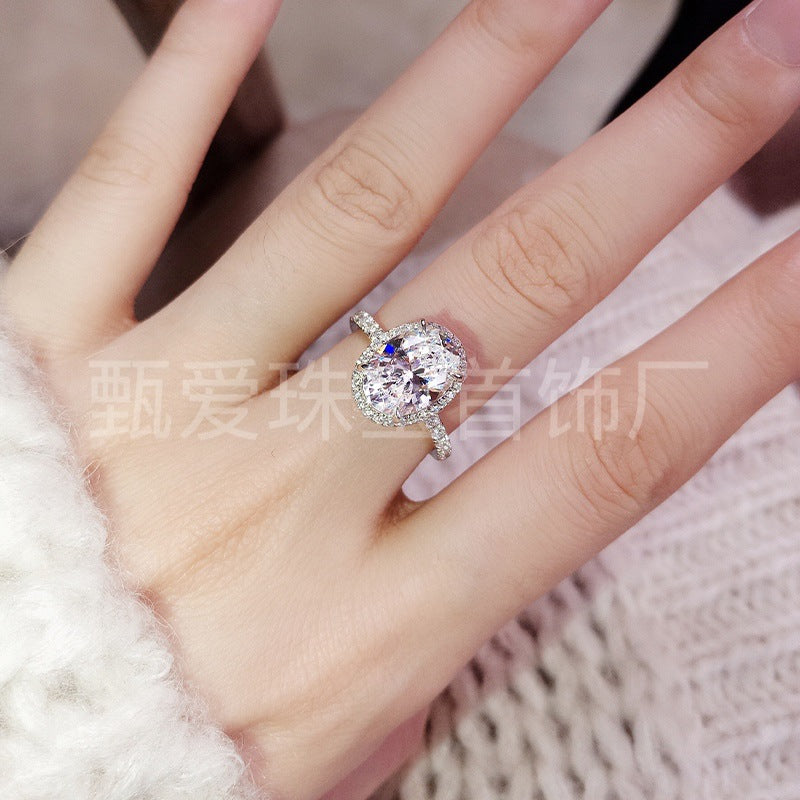 925 Silver Rhodium-plated Gold Oval Pigeon Egg Diamond Ring Female 3 Karat